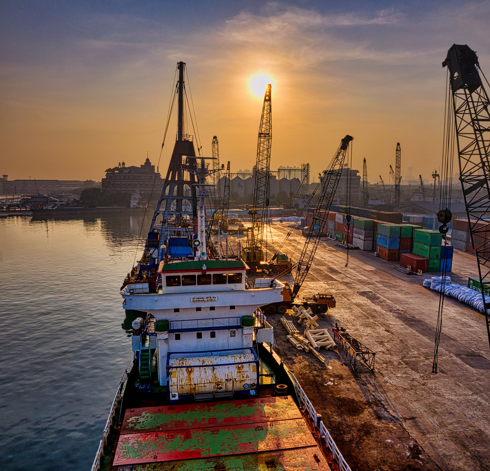 White and Green Cargo Ship